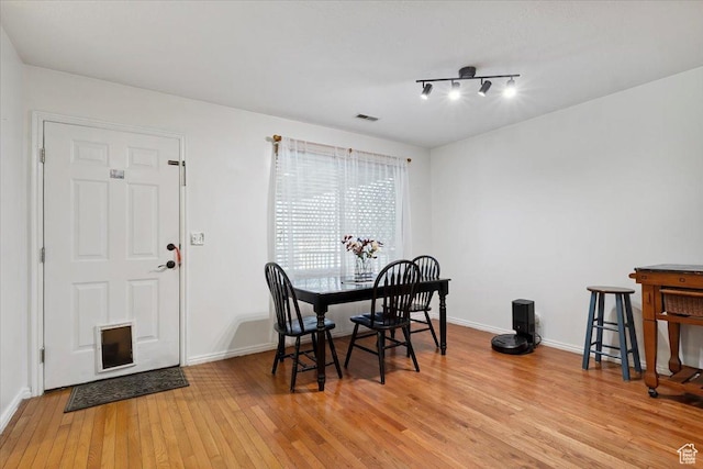 2793 S Cyprus Grove Cir W, Magna, UT 84044 - dining room featuring light wood-style flooring and baseboards