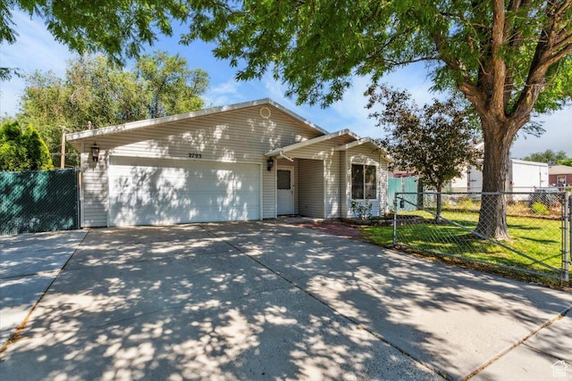 2793 S Cyprus Grove Cir W, Magna, UT 84044 - single story home with a garage and driveway