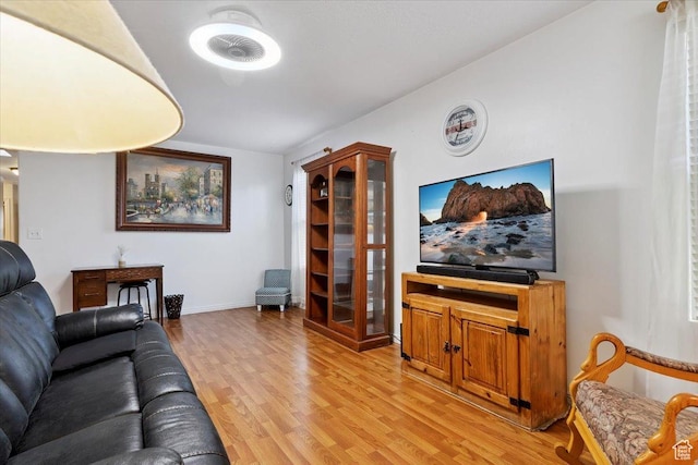 2793 S Cyprus Grove Cir W, Magna, UT 84044 - living room with light wood-style flooring and baseboards