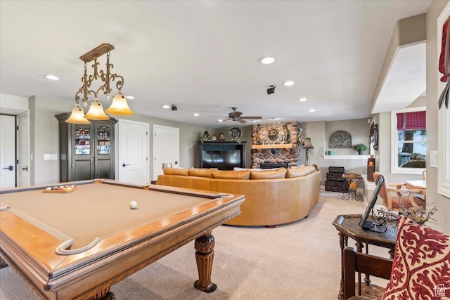 1677 E Wylie Ln, Draper, UT 84020 - rec room featuring recessed lighting, a stone fireplace, a ceiling fan, and light carpet
