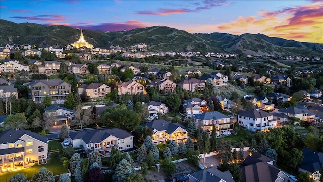 1677 E Wylie Ln, Draper, UT 84020 - aerial view at dusk of a mountain view and a residential view