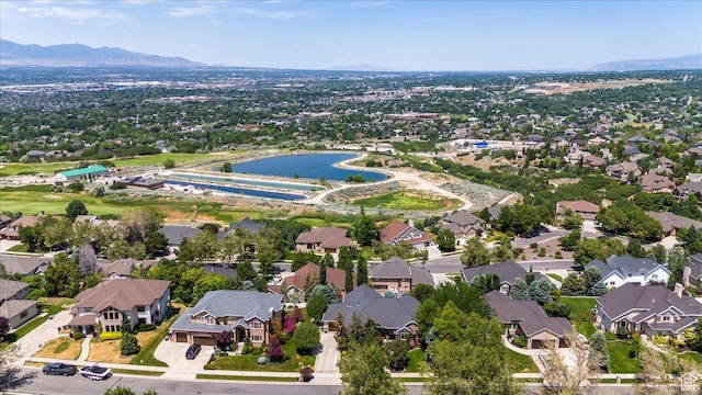 1677 E Wylie Ln, Draper, UT 84020 - aerial overview of property's location with nearby suburban area and a water and mountain view