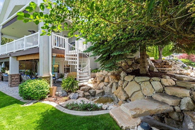 1677 E Wylie Ln, Draper, UT 84020 - view of yard featuring stairs, a patio, and a wooden deck