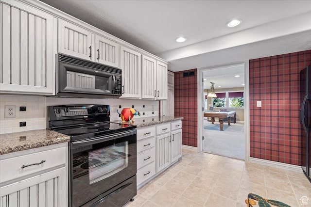 1677 E Wylie Ln, Draper, UT 84020 - kitchen with black appliances, white cabinetry, light stone countertops, recessed lighting, and backsplash