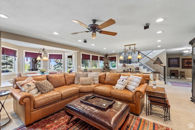 1677 E Wylie Ln, Draper, UT 84020 - living area with a chandelier, stairs, light colored carpet, recessed lighting, and ceiling fan