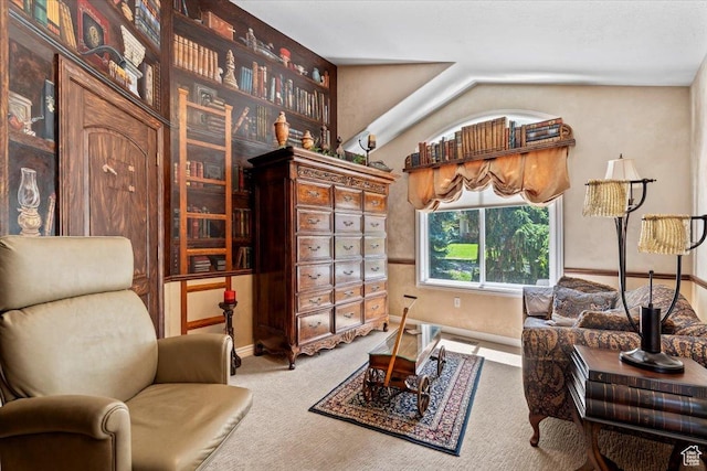 1677 E Wylie Ln, Draper, UT 84020 - carpeted living area featuring vaulted ceiling and baseboards