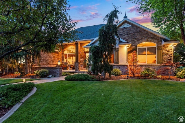 1677 E Wylie Ln, Draper, UT 84020 - view of front of home with stone siding and a yard