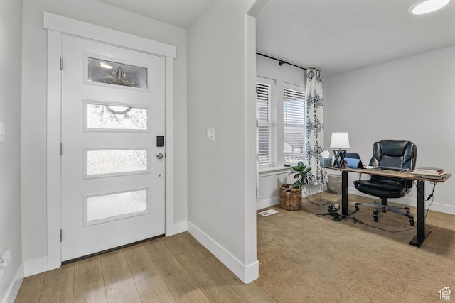 499 N Stone Ridge Dr, Saratoga Springs, UT 84045 - foyer with baseboards and wood finished floors