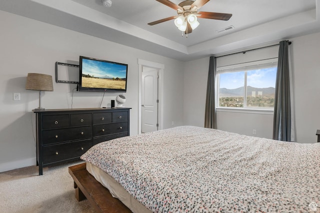 499 N Stone Ridge Dr, Saratoga Springs, UT 84045 - carpeted bedroom featuring a raised ceiling and ceiling fan