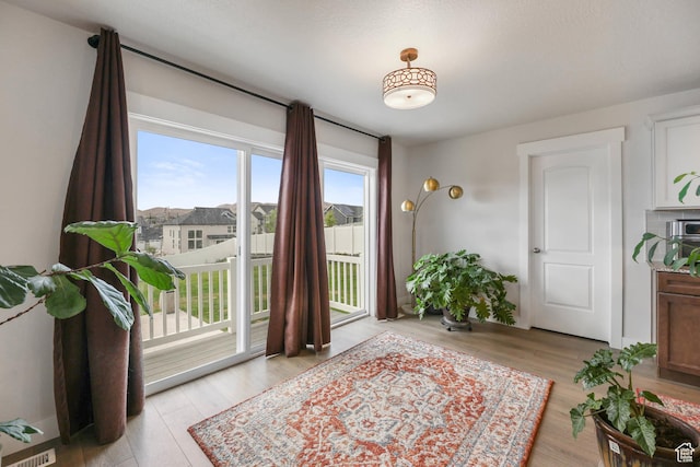 499 N Stone Ridge Dr, Saratoga Springs, UT 84045 - doorway to outside with light wood-style flooring