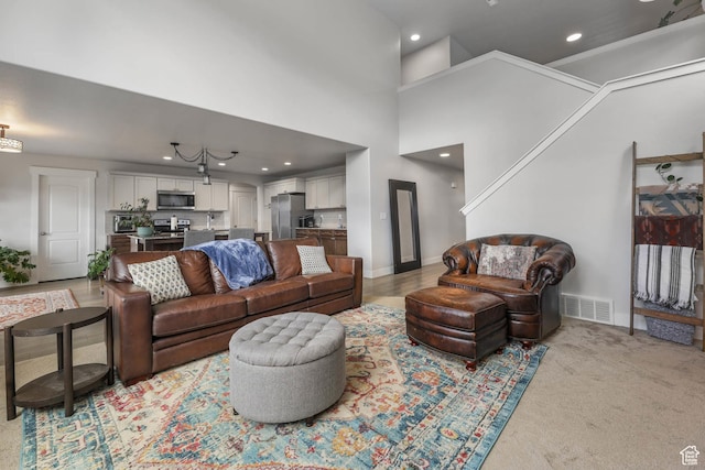 499 N Stone Ridge Dr, Saratoga Springs, UT 84045 - living room featuring recessed lighting and light carpet