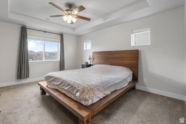 499 N Stone Ridge Dr, Saratoga Springs, UT 84045 - carpeted bedroom with a raised ceiling and a ceiling fan