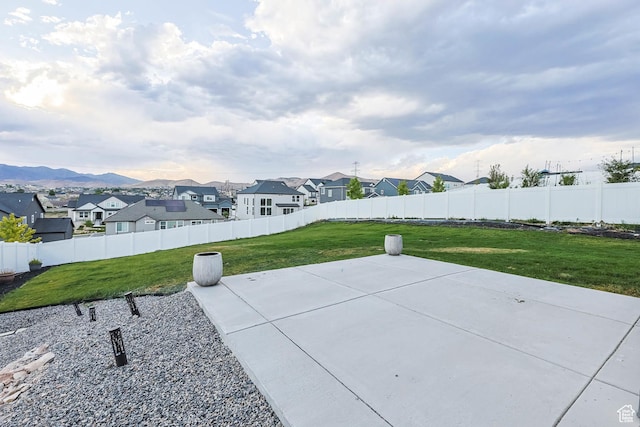 499 N Stone Ridge Dr, Saratoga Springs, UT 84045 - fenced backyard with a residential view and a patio