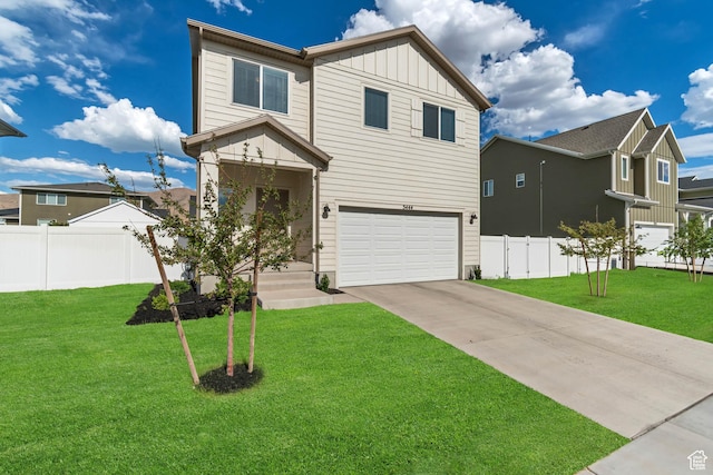 3444 Sparrow Ln W Unit 164, Eagle Mountain, UT 84005 - view of front of house featuring board and batten siding, an attached garage, and driveway