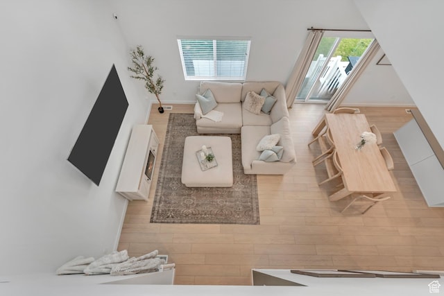 3444 Sparrow Ln W Unit 164, Eagle Mountain, UT 84005 - living area with wood finished floors and baseboards