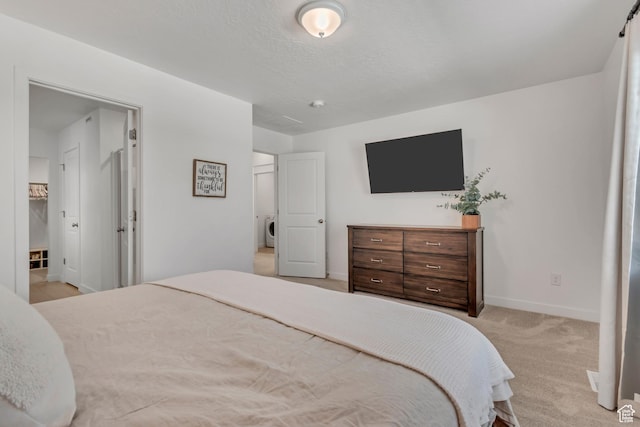 3444 Sparrow Ln W Unit 164, Eagle Mountain, UT 84005 - bedroom featuring light carpet and washer / dryer