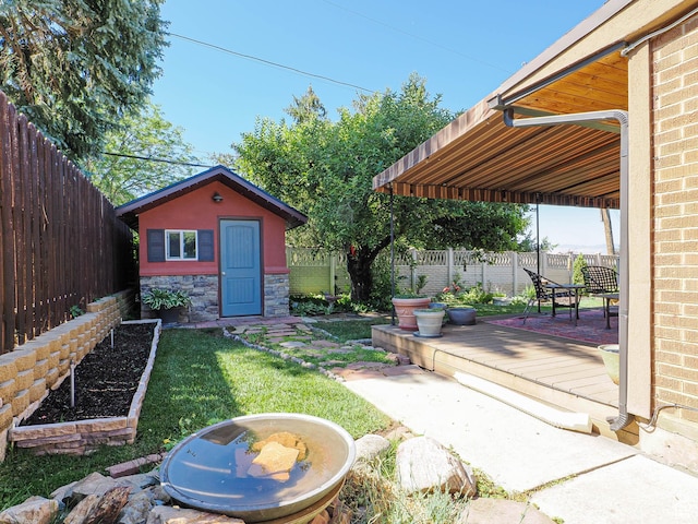 2680 E 2100th St S Unit 44-45, Salt Lake City, UT 84109 - fenced backyard featuring an outdoor structure and a patio