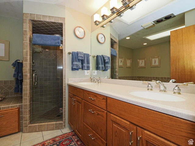 2680 E 2100th St S Unit 44-45, Salt Lake City, UT 84109 - full bathroom featuring double vanity, tile patterned flooring, and a stall shower