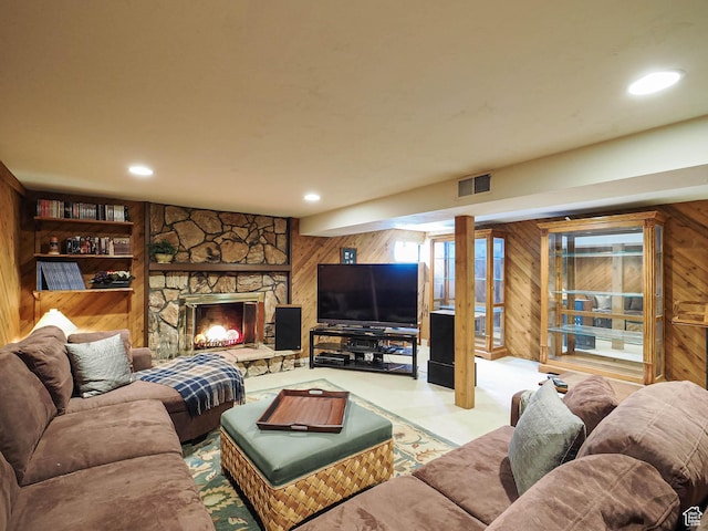 2680 E 2100th St S Unit 44-45, Salt Lake City, UT 84109 - living area with wooden walls, a stone fireplace, and recessed lighting