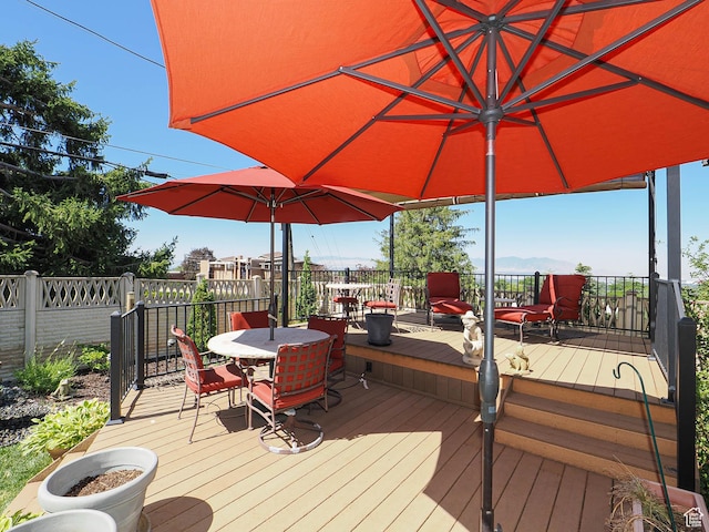 2680 E 2100th St S Unit 44-45, Salt Lake City, UT 84109 - wooden terrace with outdoor dining space