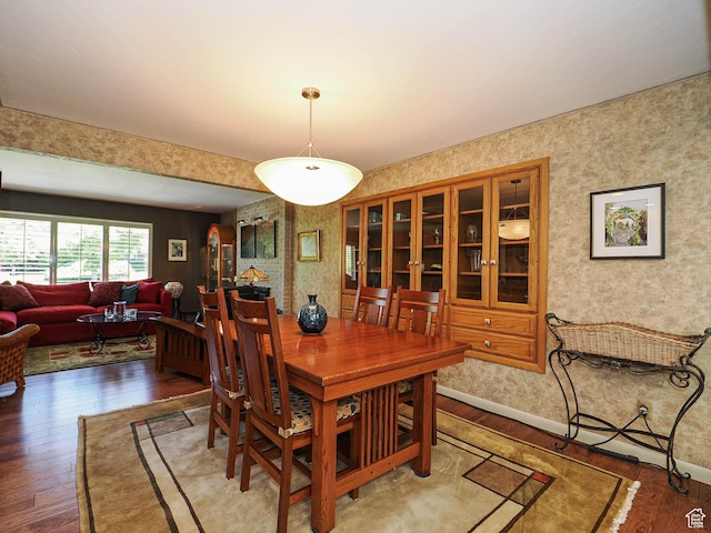 2680 E 2100th St S Unit 44-45, Salt Lake City, UT 84109 - dining space featuring wood finished floors and wallpapered walls