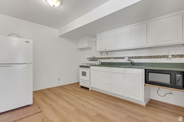 575 Upper Evergreen Dr, Park City, UT 84098 - kitchen with white appliances, decorative backsplash, white cabinetry, and light wood-style flooring