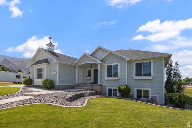 13 W 1370 S, Mona, UT 84645 - view of front of home with a front yard, roof with shingles, a chimney, and a mountain view
