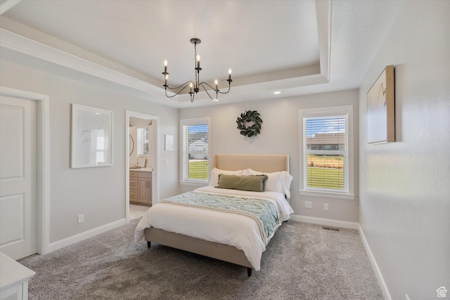 13 W 1370 S, Mona, UT 84645 - carpeted bedroom featuring a chandelier, a raised ceiling, multiple windows, and ensuite bath