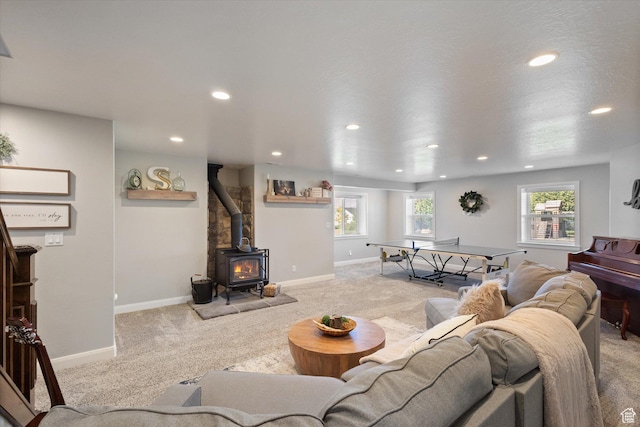 13 W 1370 S, Mona, UT 84645 - living area featuring light carpet, recessed lighting, and a wood stove