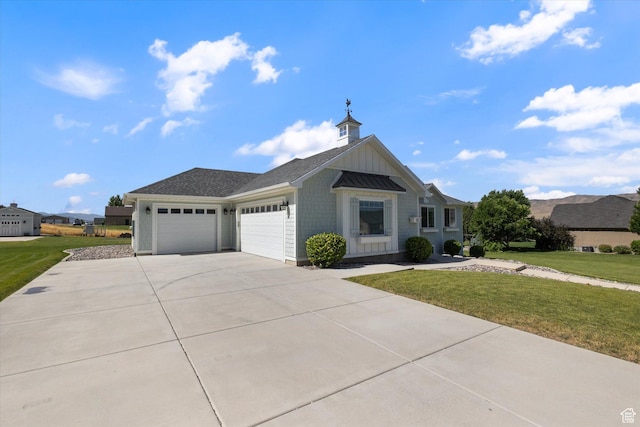 13 W 1370 S, Mona, UT 84645 - view of front facade with an attached garage, a front yard, driveway, and a standing seam roof