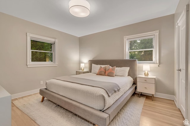 1221 E 800 S, Salt Lake City, UT 84102 - bedroom featuring light wood-type flooring and baseboards