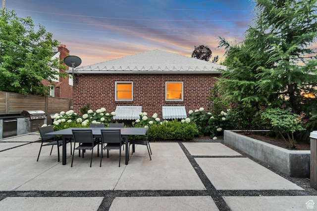 1221 E 800 S, Salt Lake City, UT 84102 - patio terrace at dusk with outdoor dining space, a patio, and a grill