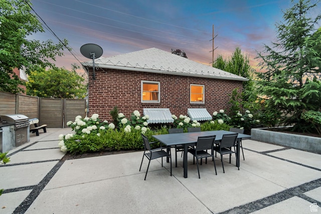 1221 E 800 S, Salt Lake City, UT 84102 - patio terrace at dusk featuring outdoor dining space, a patio, and area for grilling