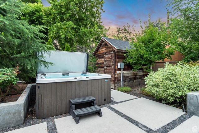 1221 E 800 S, Salt Lake City, UT 84102 - patio terrace at dusk with a hot tub and a patio