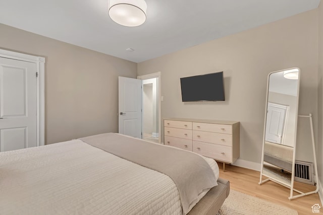 1221 E 800 S, Salt Lake City, UT 84102 - bedroom featuring light wood-type flooring and baseboards