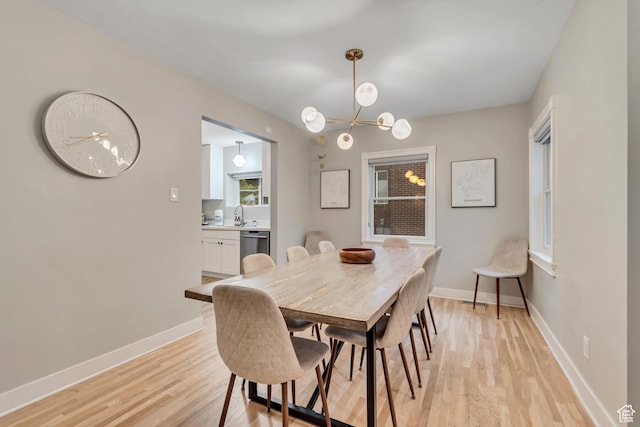 1221 E 800 S, Salt Lake City, UT 84102 - dining room featuring light wood finished floors and a chandelier