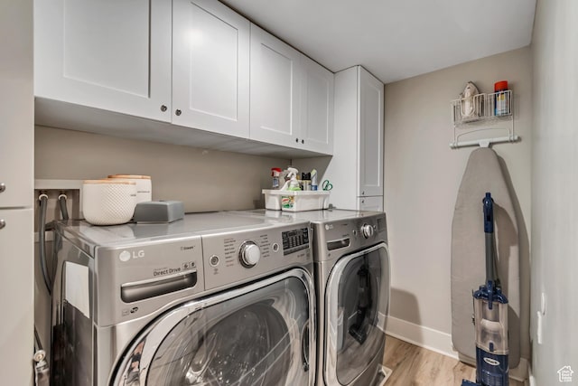 1221 E 800 S, Salt Lake City, UT 84102 - laundry room with cabinet space, independent washer and dryer, and light wood-style floors
