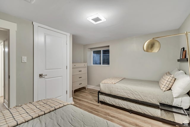 1221 E 800 S, Salt Lake City, UT 84102 - bedroom featuring wood finished floors and baseboards