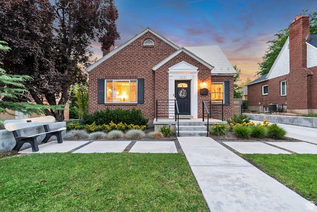 1221 E 800 S, Salt Lake City, UT 84102 - bungalow-style house with brick siding and a front yard