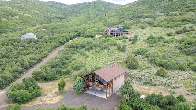 1674 S Cottonwood Ct Unit 1217, Heber City, UT 84032 - view from above of property with a heavily wooded area and a mountain backdrop