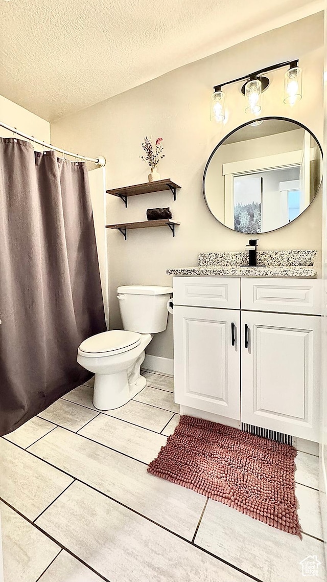 2408 E Maple Dr, Eagle Mountain, UT 84005 - full bathroom with vanity, a textured ceiling, and curtained shower