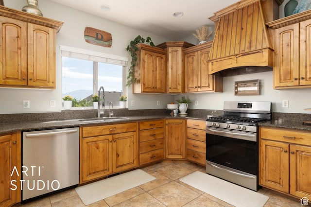 2244 S Hunter Dr, Saratoga Springs, UT 84045 - kitchen featuring appliances with stainless steel finishes, custom exhaust hood, brown cabinets, and recessed lighting