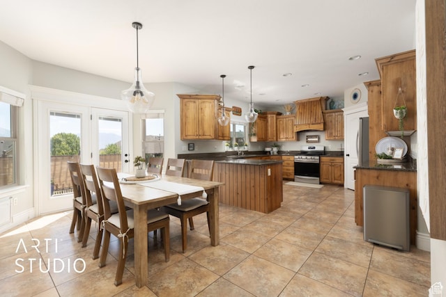 2244 S Hunter Dr, Saratoga Springs, UT 84045 - dining area with healthy amount of natural light, light tile patterned flooring, and recessed lighting