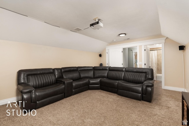 2244 S Hunter Dr, Saratoga Springs, UT 84045 - carpeted home theater room featuring lofted ceiling and baseboards