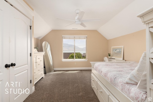 2244 S Hunter Dr, Saratoga Springs, UT 84045 - bedroom with lofted ceiling, dark carpet, and a ceiling fan