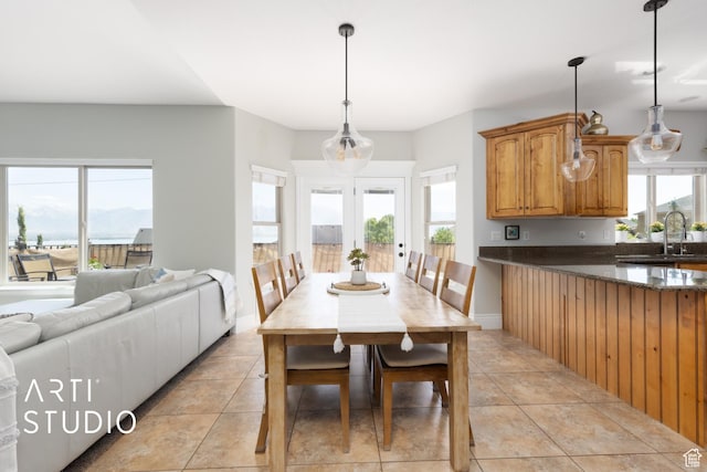 2244 S Hunter Dr, Saratoga Springs, UT 84045 - dining area featuring light tile patterned floors