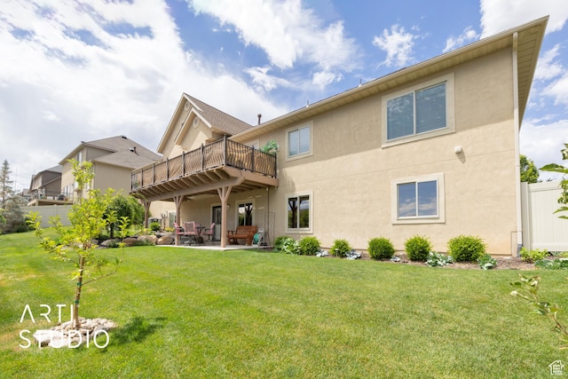 2244 S Hunter Dr, Saratoga Springs, UT 84045 - rear view of house featuring a balcony, stucco siding, a patio, and a yard