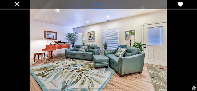 2244 S Hunter Dr, Saratoga Springs, UT 84045 - living area with light wood-type flooring and recessed lighting
