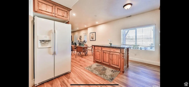 2244 S Hunter Dr, Saratoga Springs, UT 84045 - kitchen with white refrigerator with ice dispenser, light wood-type flooring, and recessed lighting