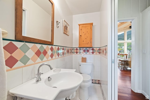 235 Mchenry Ave, Park City, UT 84060 - half bathroom with tile walls and wainscoting